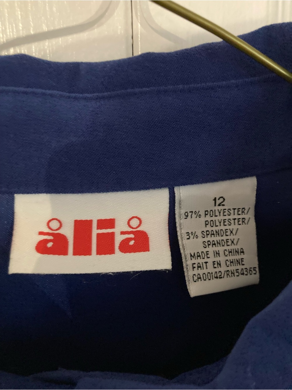 Alia Blue Blouse with Red Logo Detail - Picture 2 of 5